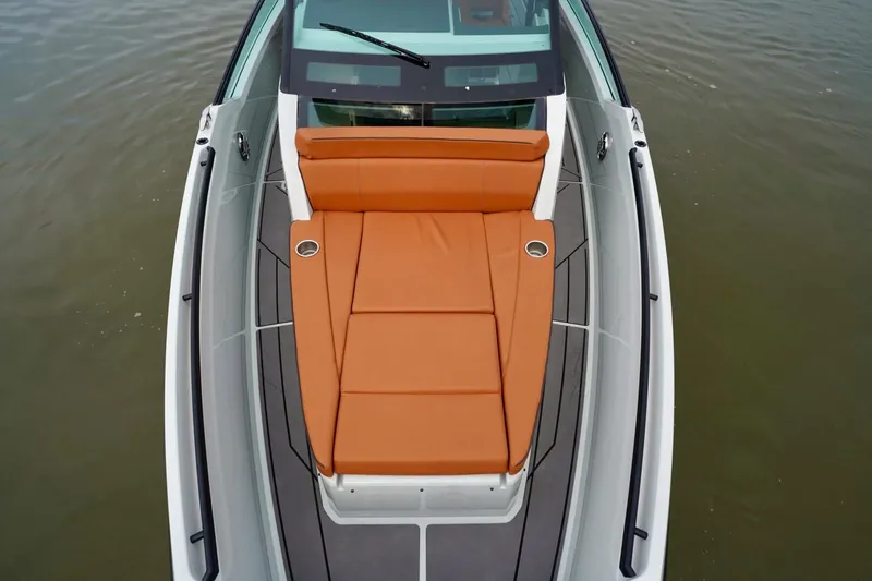  Yacht Photos Pics 2023 Saxdor 320 GTO boat with orange sunbed on deck, viewed from above.