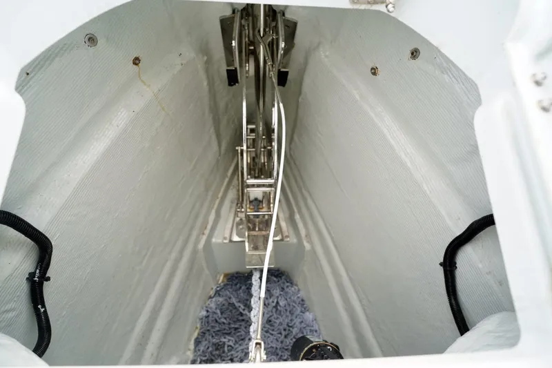  Yacht Photos Pics Anchor compartment of 2023 Saxdor 320 GTO boat, featuring clean interior and metal fittings.
