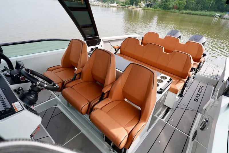  Yacht Photos Pics 2023 Saxdor 320 GTO boat interior with tan leather seats and modern design.