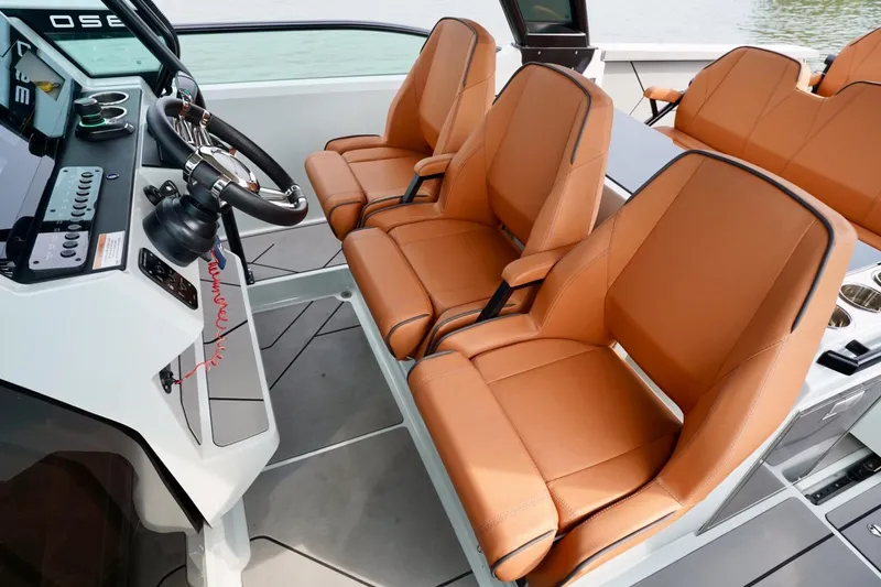  Yacht Photos Pics 2023 Saxdor 320 GTO interior with tan leather seats and modern steering console.