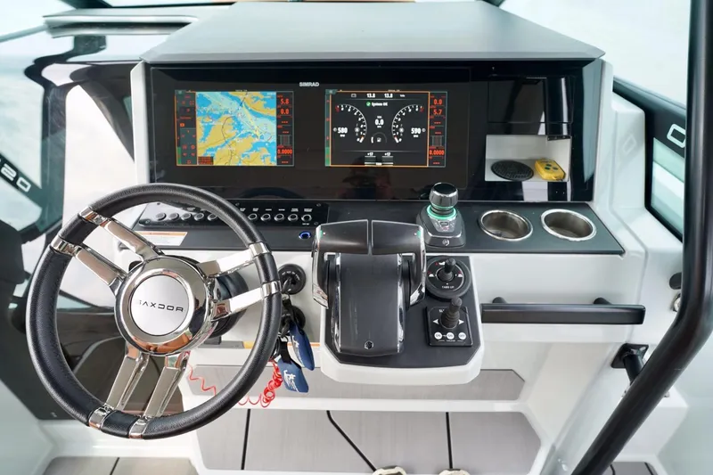  Yacht Photos Pics Cockpit of 2023 Saxdor 320 GTO with advanced navigation and control systems.