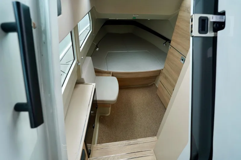  Yacht Photos Pics Interior cabin of 2023 Saxdor 320 GTO boat with modern design and wood accents.