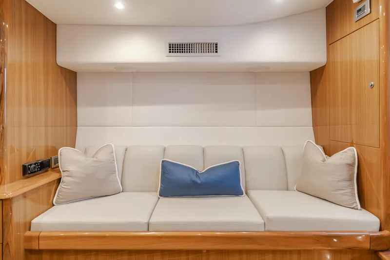 Champion Yacht Photos Pics Luxurious interior of 2022 Viking 38 Open Billfish with plush seating and cushions.