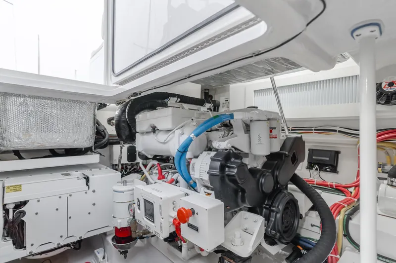 Champion Yacht Photos Pics Engine room of 2022 Viking 38 Open Billfish, showcasing advanced marine machinery.