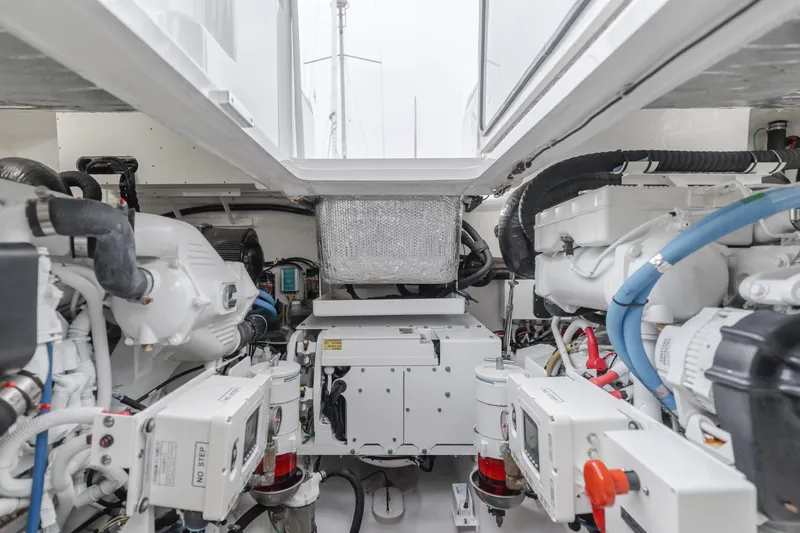Champion Yacht Photos Pics Engine room of 2022 Viking 38 Open Billfish, showcasing advanced marine machinery and components.