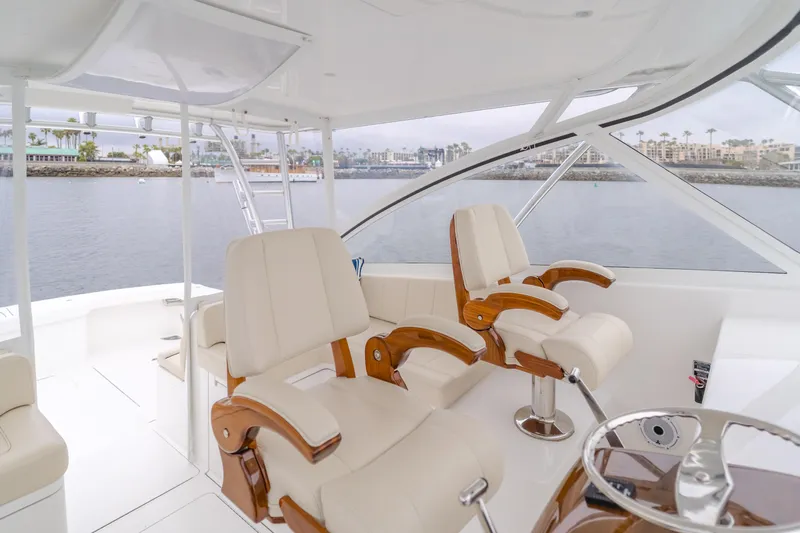 Champion Yacht Photos Pics 2022 Viking 38 Open Billfish yacht interior with luxurious seating and ocean view.