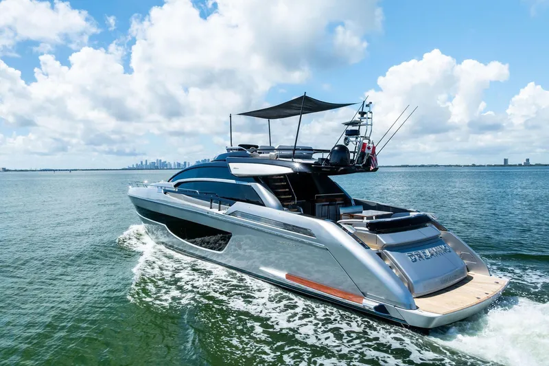 Dreaming Yacht Photos Pics 2023 Riva 76 PERSEO Super yacht cruising on open water under a clear sky.