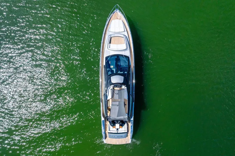 Dreaming Yacht Photos Pics Aerial view of 2023 Riva 76 PERSEO Super yacht on green water.