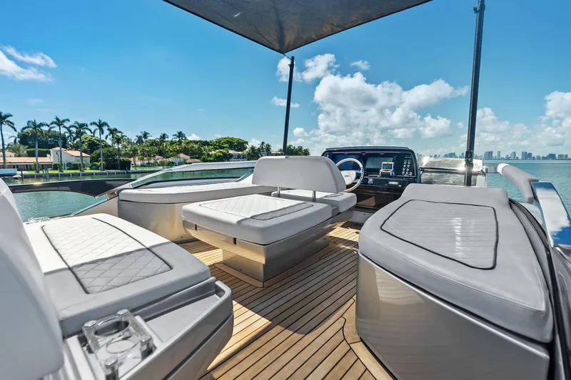 Dreaming Yacht Photos Pics Luxurious 2023 Riva 76 PERSEO Super yacht deck with elegant seating and ocean view.