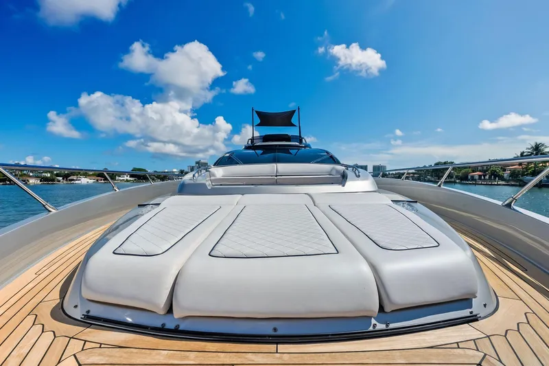 Dreaming Yacht Photos Pics Luxurious 2023 Riva 76 PERSEO Super yacht deck under clear blue sky.