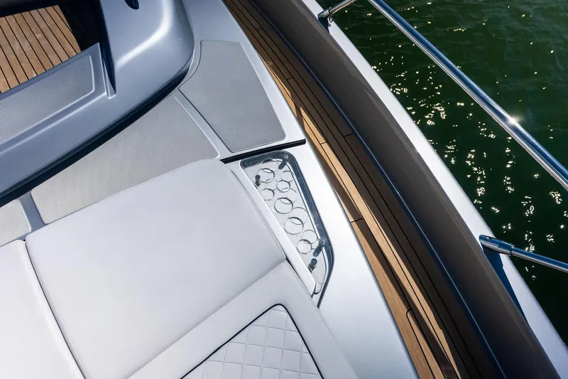 Dreaming Yacht Photos Pics Luxurious deck of 2023 Riva 76 PERSEO Super yacht with elegant seating and cup holders.