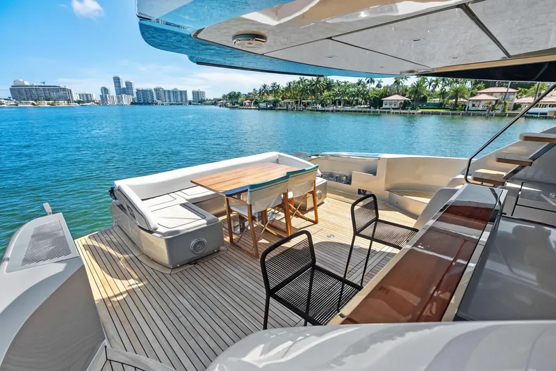 Dreaming Yacht Photos Pics Luxurious deck of 2023 Riva 76 PERSEO Super yacht with waterfront view.