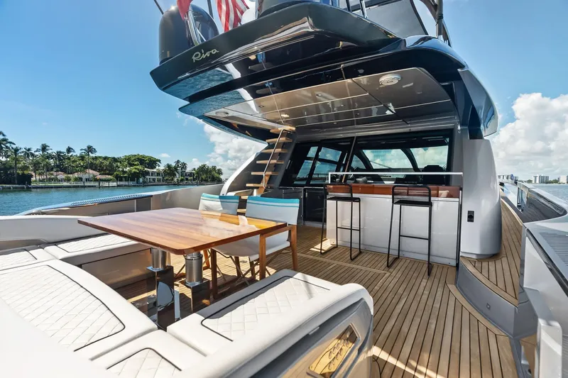 Dreaming Yacht Photos Pics Luxurious 2023 Riva 76 PERSEO Super yacht deck with elegant seating and ocean view.