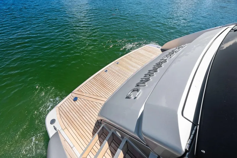 Dreaming Yacht Photos Pics Riva 76 PERSEO Super 2023 yacht with sleek deck design on calm water.