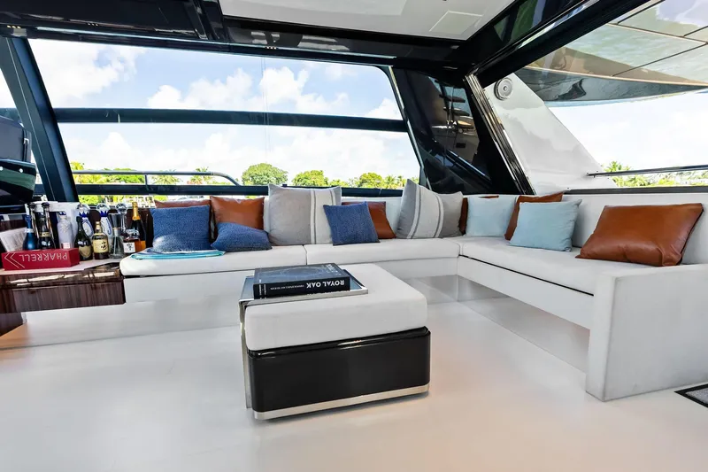 Dreaming Yacht Photos Pics Luxurious interior of 2023 Riva 76 PERSEO Super yacht with elegant seating and decor.