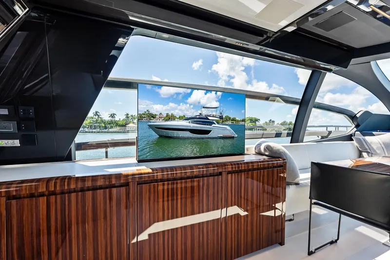 Dreaming Yacht Photos Pics Luxurious interior of 2023 Riva 76 PERSEO Super yacht with sleek wood finishes.