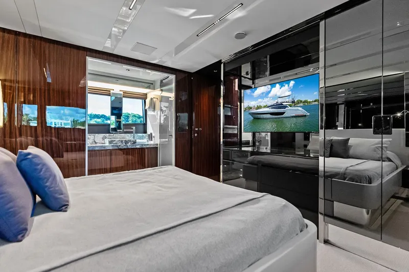 Dreaming Yacht Photos Pics Luxurious bedroom interior of 2023 Riva 76 PERSEO Super yacht with modern design elements.