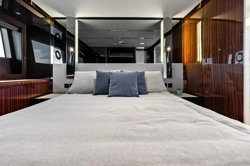 Dreaming Yacht Photos Pics Luxurious bedroom interior of 2023 Riva 76 PERSEO Super yacht with modern design elements.