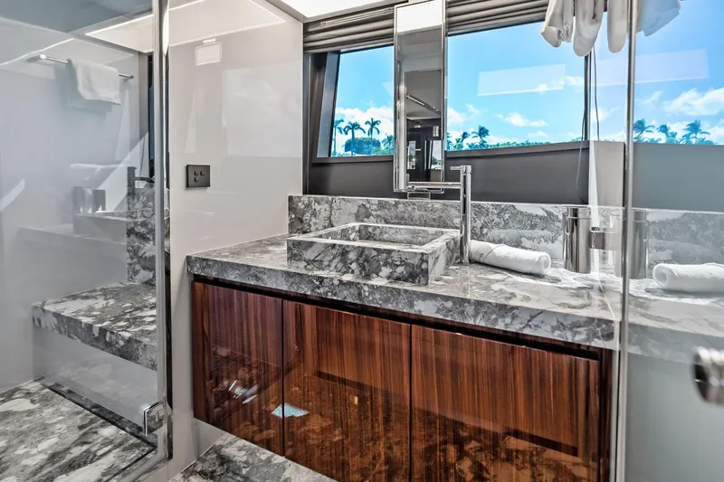 Dreaming Yacht Photos Pics Luxurious bathroom interior of 2023 Riva 76 PERSEO Super yacht with marble sink and modern fixtures.