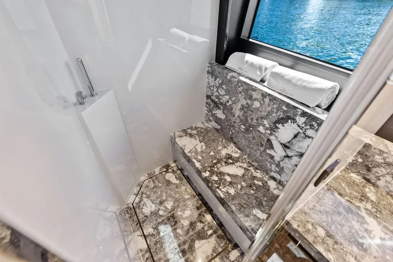Dreaming Yacht Photos Pics Luxurious marble bathroom interior on 2023 Riva 76 PERSEO Super yacht.