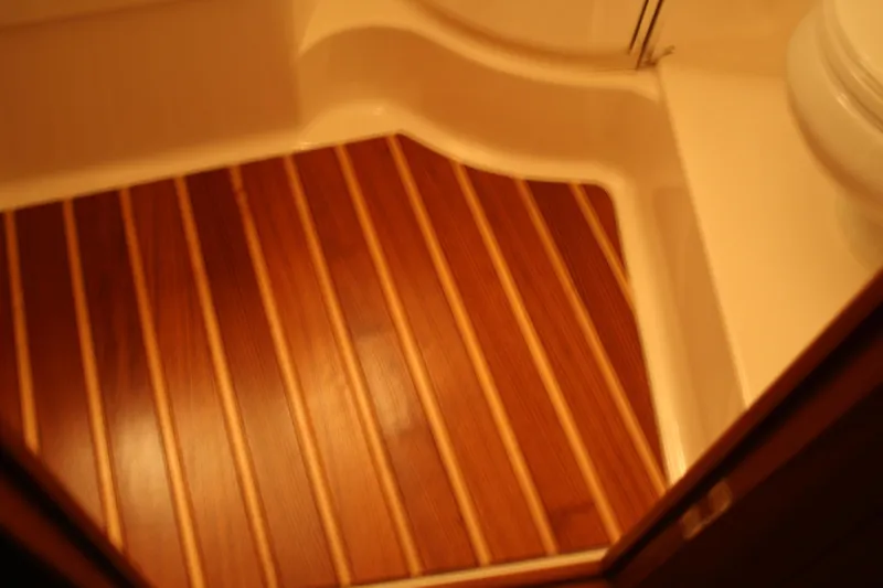  Yacht Photos Pics Wooden flooring in a 2001 Tiara Yachts 4000 Express boat interior.