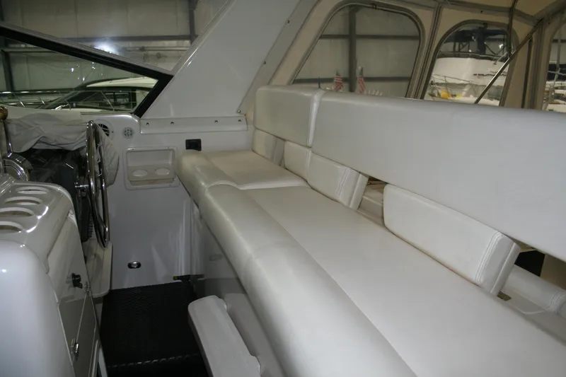  Yacht Photos Pics 2001 Tiara Yachts 4000 Express interior with white seating and helm area.