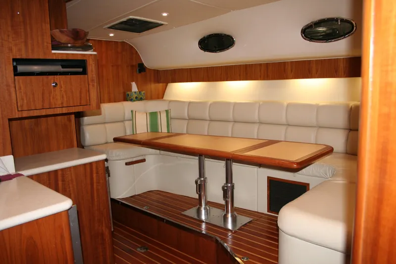  Yacht Photos Pics Interior of 2001 Tiara Yachts 4000 Express with elegant wood and leather seating.
