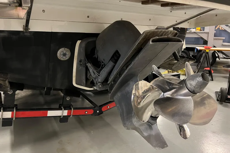  Yacht Photos Pics Close-up of the propeller and stern drive of a 2021 Sargo 25 boat.