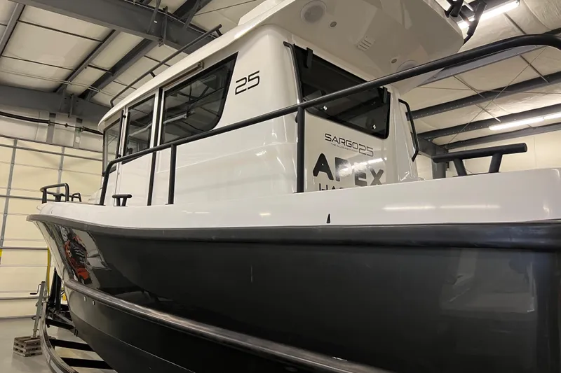  Yacht Photos Pics 2021 Sargo 25 boat in a warehouse.