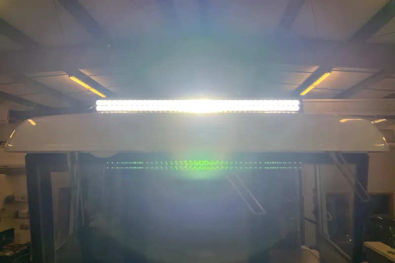  Yacht Photos Pics Sargo 25 boat 2021 model with bright LED light bar in a garage.