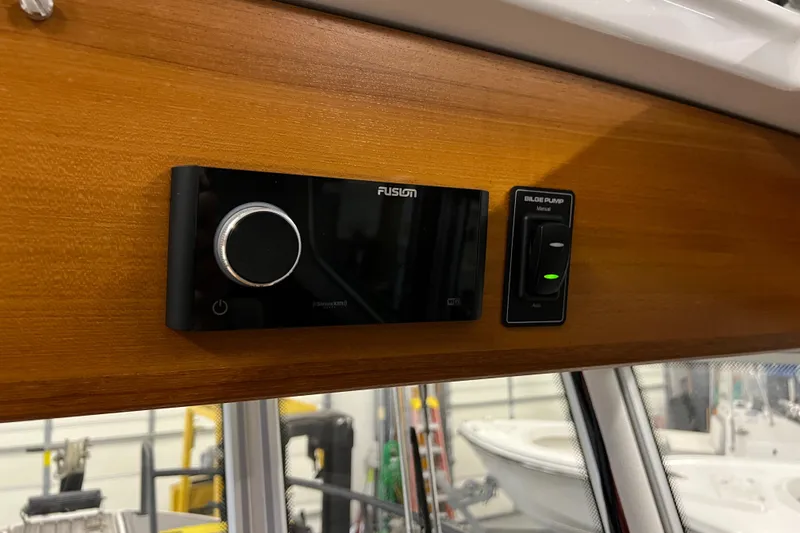  Yacht Photos Pics Fusion stereo system and control panel in 2021 Sargo 25 boat interior.
