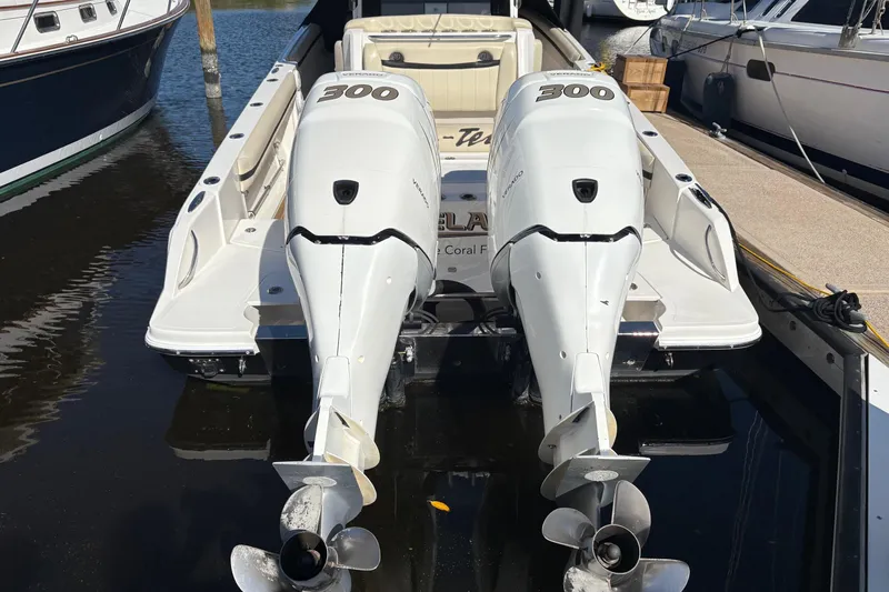  Yacht Photos Pics 2012 Nor-Tech 340 Sport Center Console with twin 300 horsepower engines docked at marina.