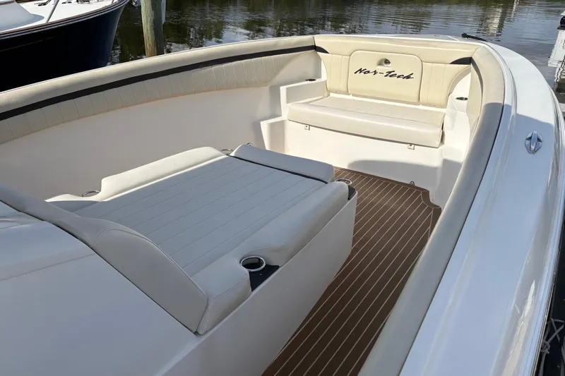  Yacht Photos Pics 2012 Nor-Tech 340 Sport Center Console boat interior with cushioned seating.