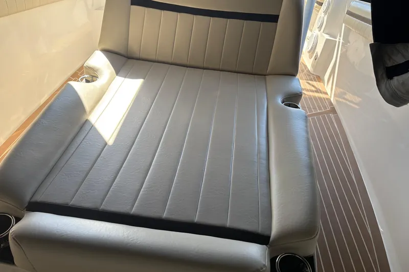  Yacht Photos Pics Interior seating of 2012 Nor-Tech 340 Sport Center Console boat with cup holders.