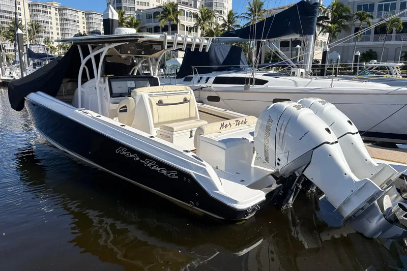  Yacht Photos Pics 2012 Nor-Tech 340 Sport Center Console boat docked with twin Mercury engines.