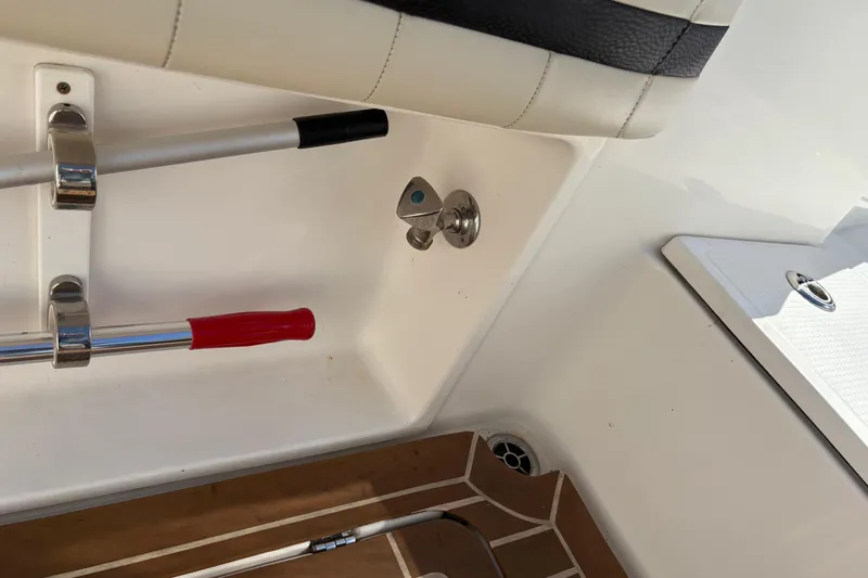  Yacht Photos Pics 2012 Nor-Tech 340 Sport Center Console interior with rod holder and deck details.