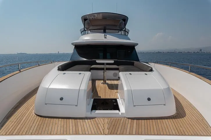 Grey T Yacht Photos Pics Azimut Magellano 66 yacht, 2021 model, featuring spacious deck and modern design on open water.
