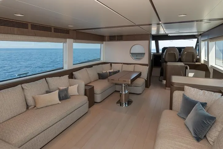 Grey T Yacht Photos Pics Luxurious interior of 2021 Azimut Magellano 66 yacht with ocean view.