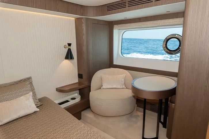 Grey T Yacht Photos Pics Luxurious cabin interior of 2021 Azimut Magellano 66 yacht with ocean view.