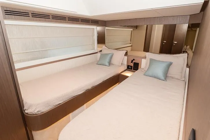 Grey T Yacht Photos Pics Interior of 2021 Azimut Magellano 66 yacht with twin beds and modern decor.
