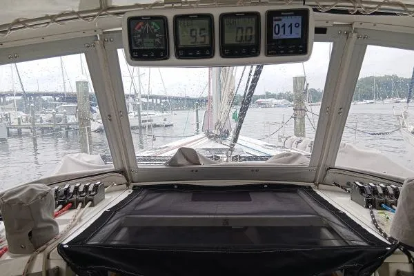 Mandala Yacht Photos Pics Interior view of a 2002 Catalina 42 MkII sailboat cockpit with navigation instruments.