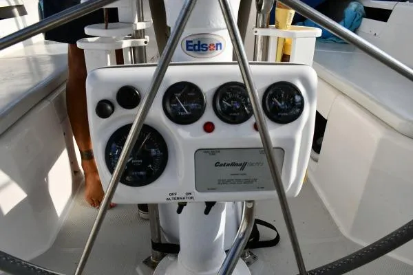 Mandala Yacht Photos Pics Control panel of a 2002 Catalina 42 MkII sailboat with gauges and Edson branding.