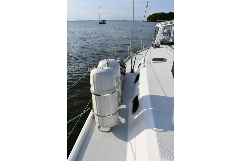 Mandala Yacht Photos Pics Deck view of 2002 Catalina 42 MkII sailboat with ocean backdrop.