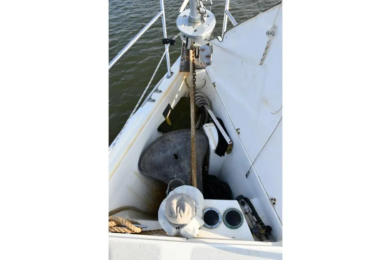 Mandala Yacht Photos Pics Bow of 2002 Catalina 42 MkII sailboat with anchor and ropes.