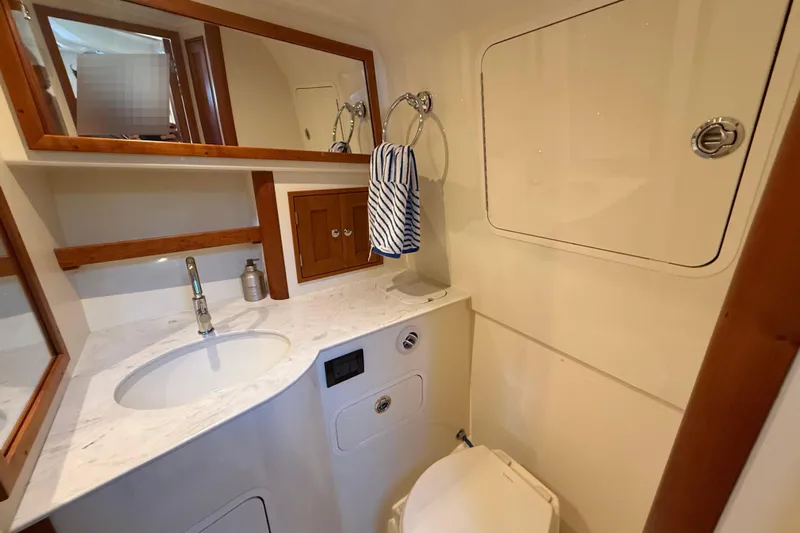  Yacht Photos Pics Luxurious bathroom in a 2021 Hinckley Sport Boats 40x yacht.