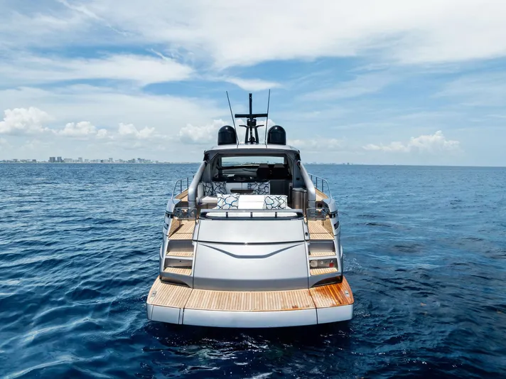 Our Trade Yacht Photos Pics 2024 Pershing 6X yacht on open sea, showcasing sleek design and luxury features.