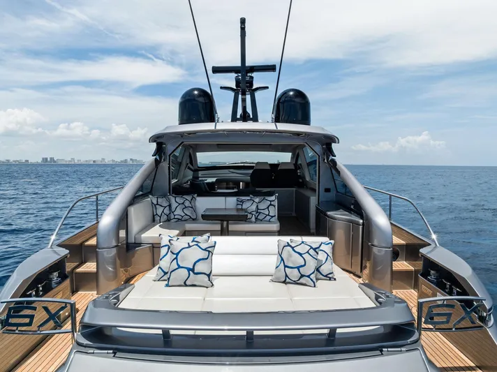 Our Trade Yacht Photos Pics 2024 Pershing 6X yacht with luxurious seating and ocean view.