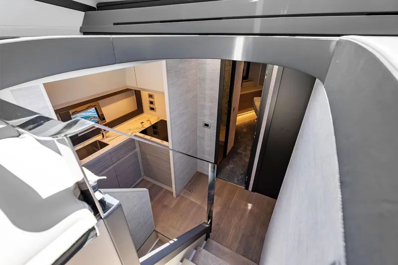 Our Trade Yacht Photos Pics Interior view of 2024 Pershing 6X yacht, featuring modern design and luxurious finishes.