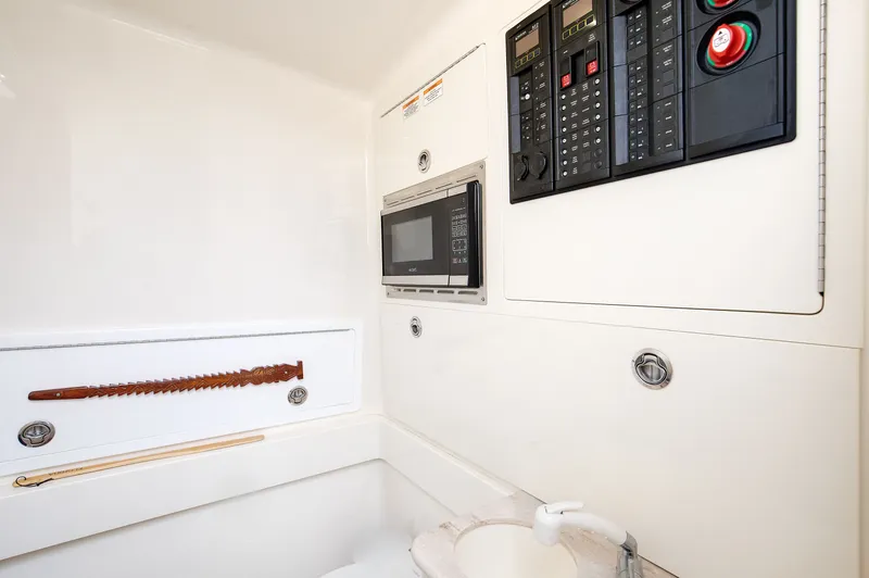 China Girl Yacht Photos Pics 2020 Valhalla V-41 boat interior with control panel and microwave.