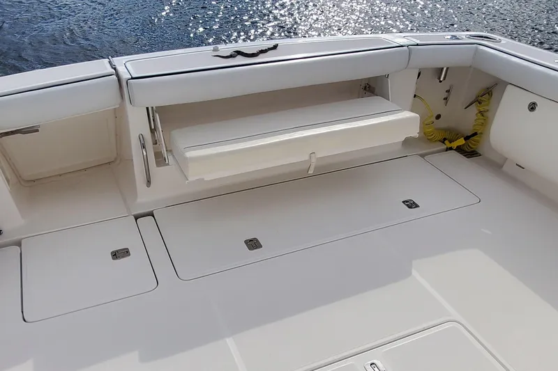 Cruse Yacht Photos Pics 2006 Tiara Yachts 4200 Open deck with foldable seating and storage compartments.